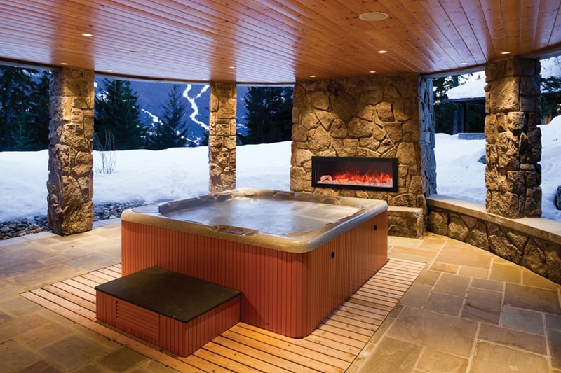 Amantii 40" Panorama Slim Indoor or Outdoor Electric Fireplace-BI-40-SLIM-OD- Lifestyle Jacuzzi Pool With Stone Wall Fireplace