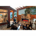 Amantii 60" Panorama Slim Indoor or Outdoor Electric Fireplace BI-60-SLIM-OD- Lifestyle Terrace With Stone Wall Fireplace