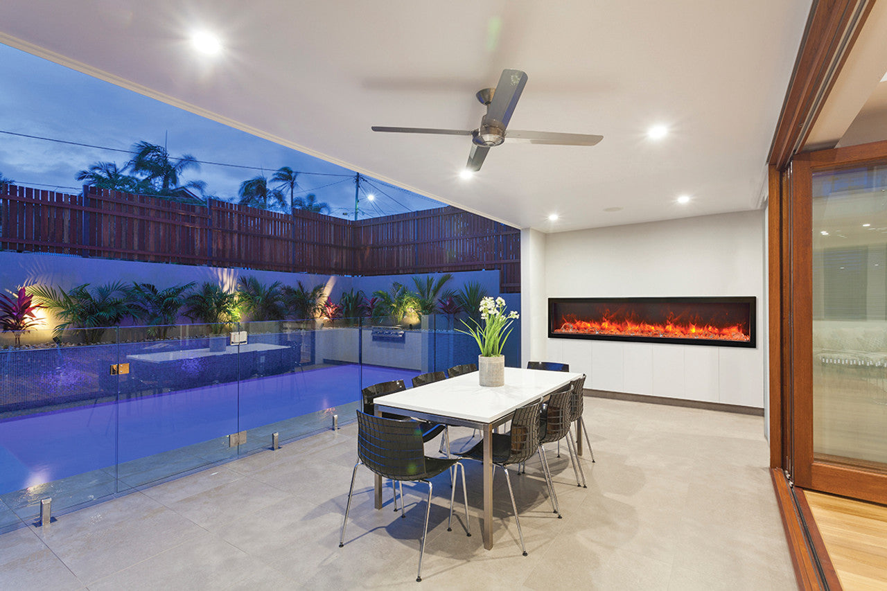 Amantii 88" Panorama Deep Indoor or Outdoor Electric Fireplace -BI-88-DEEP-OD-  Lifestyle Patio With Pool
