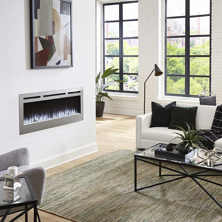 Touchstone - The Sideline Deluxe Stainless Steel 50" Recessed Electric Fireplace -86273- Lifestyle Modern Living Room With White Crystal Flames